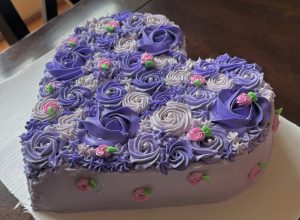 The vanilla buttercream cake, which is one of the most popular cakes on the menu, can be decorated to match the specific occasion. Photo by Adan Chaudhry. 