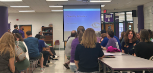 Parents and students wait for the Future of CHS Athletics meeting to start in the cafeteria on May 7.