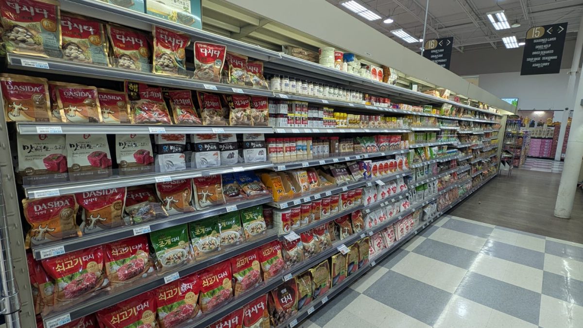 Lotte, a grocery store, stocks its aisles with predominantly imported goods. 
