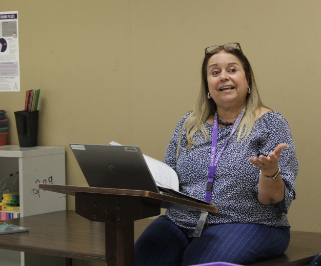 On Sept. 5, English Speakers of Other Languages teacher Nazario Cuin instructs students to pair words to pictures using visual learning.
