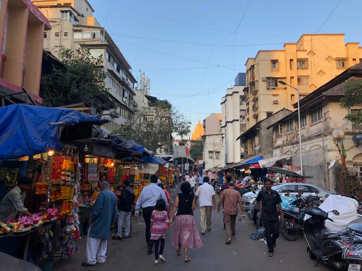 I walk down the streets of Mumbai, India in 2018 with my mom. 