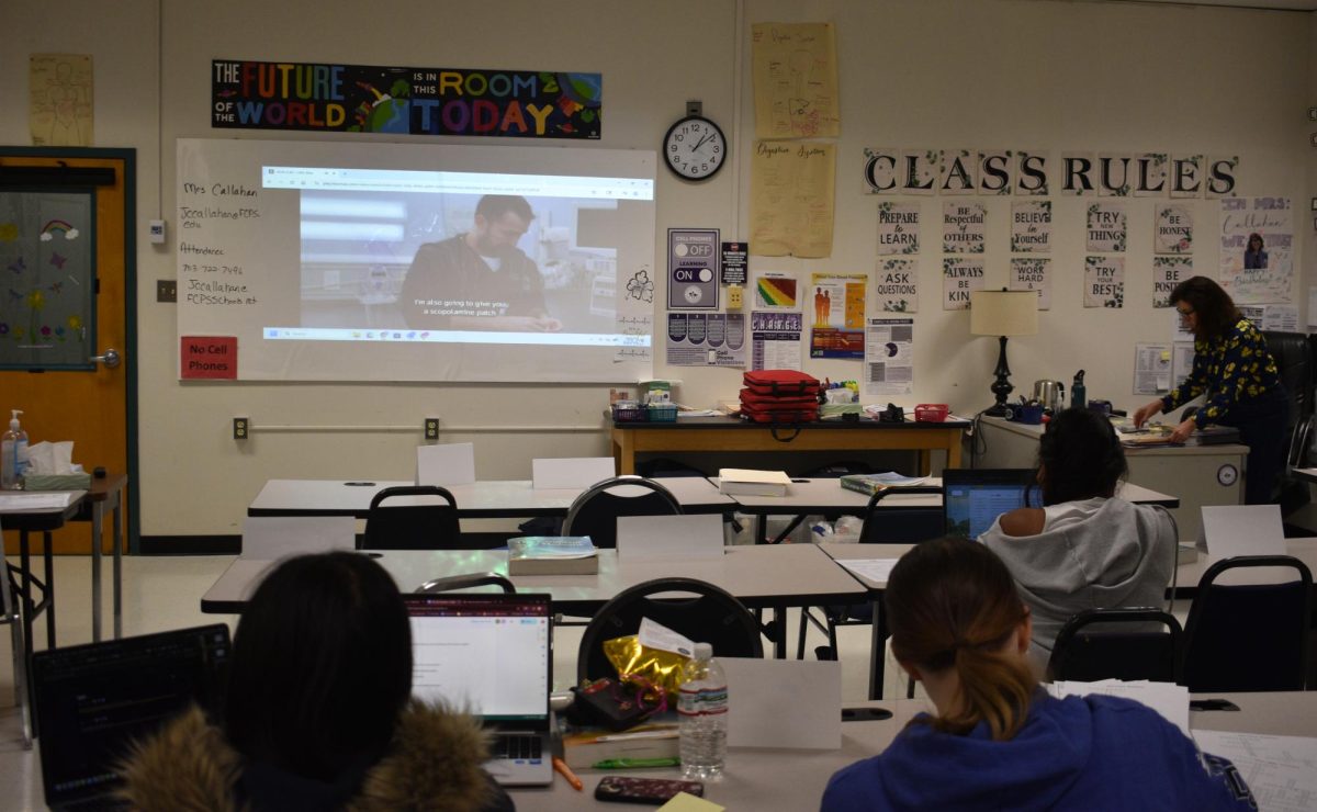 Health science teacher Jennifer Callahan plays “The Pitt” for her students while they work on April 9. 
