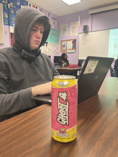 On April 13, senior Will Modzelewski drinks a Ghost energy drink to rejuvenate himself for the school day.
