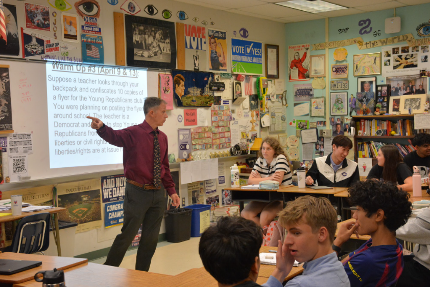 Social Studies teacher Joseph Clement starts off class with a quote of the day, a tradition in his classes. 